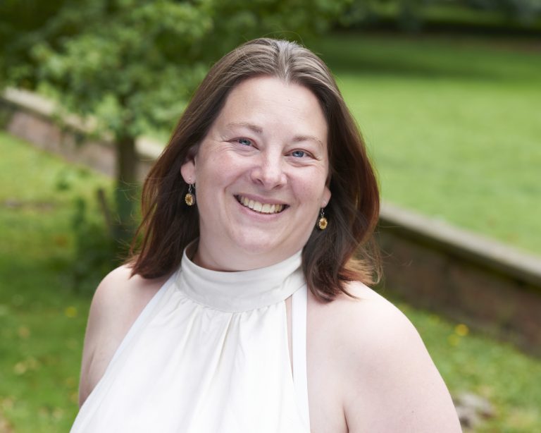 Professional headshot of Leanne Martin, Director